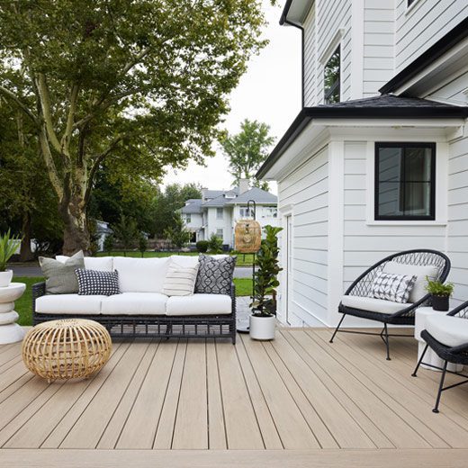 Composite Decking vs Pressure Treated Decks for Pine Island Weather