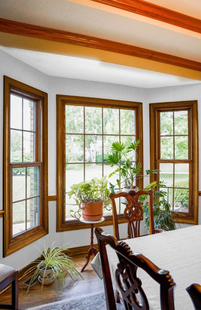 Aeris Double Hung and Picture Windows in Caramel with Colonial Grids