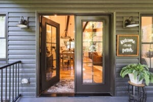 Open French doors to cozy home interior