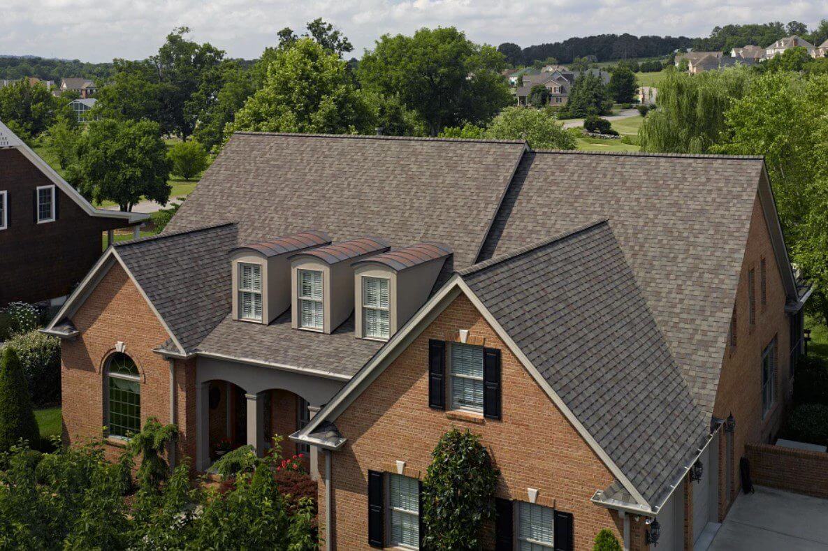 Professional roofing contractor working on Kasson MN residential roof