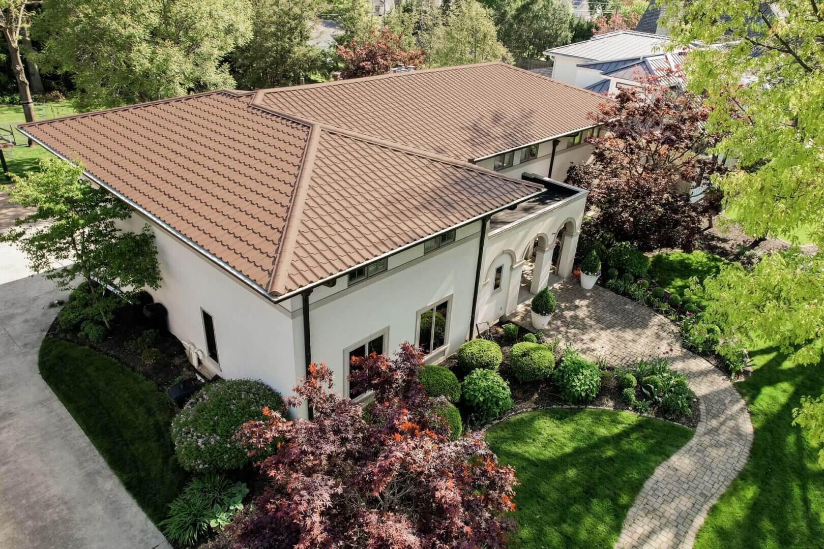 curling asphalt shingles on aging roof in Owatonna MN
