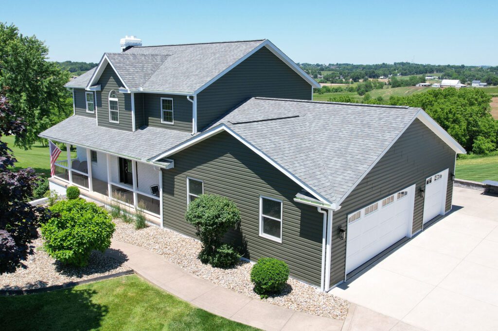 damaged siding panels allowing moisture into Pine Island MN home exterior