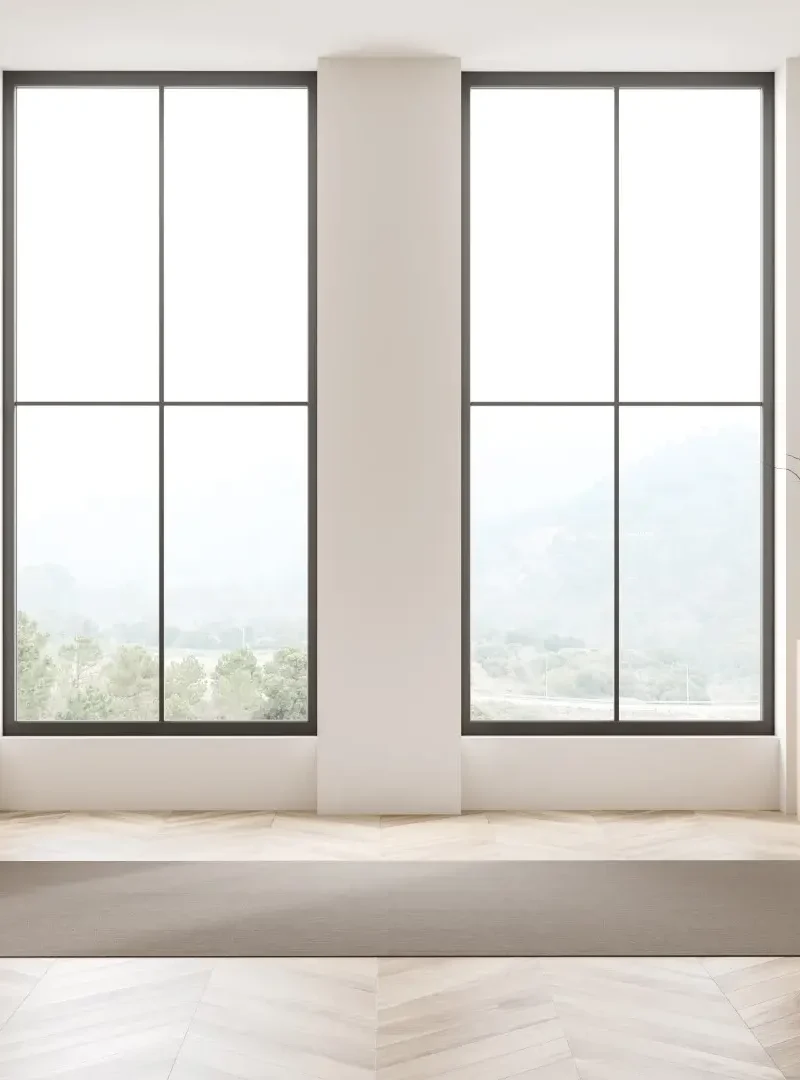 Living room interior with minimal drawers and panoramic windows.