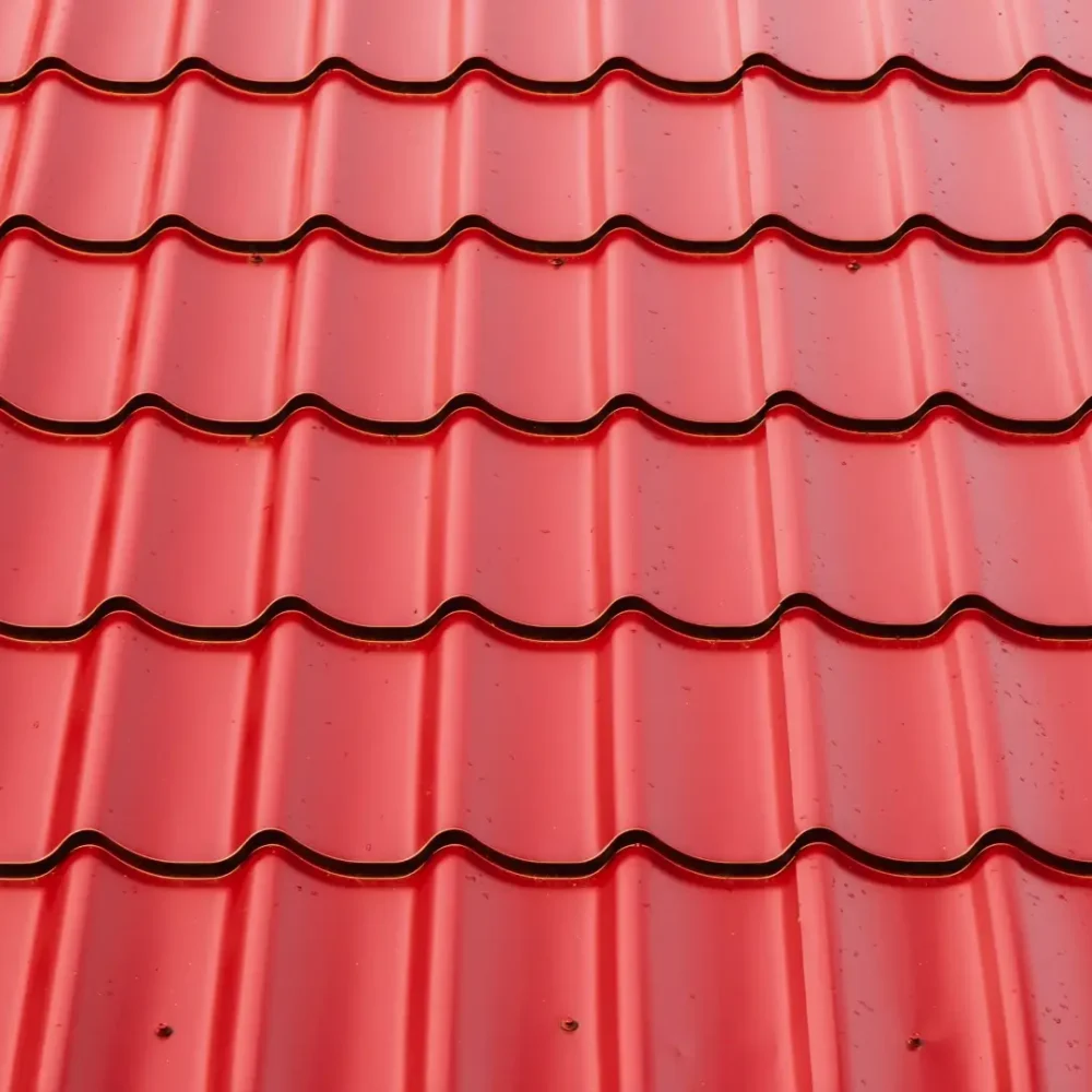 New red metal shingles roof texture.