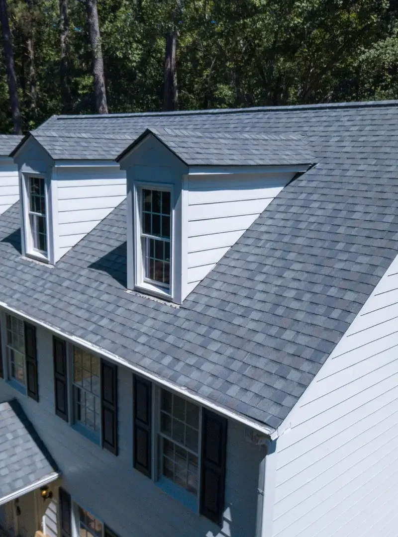 Newly constructed roof on a two-story home.