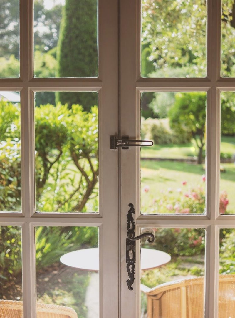 Shot of nature behind a glass door