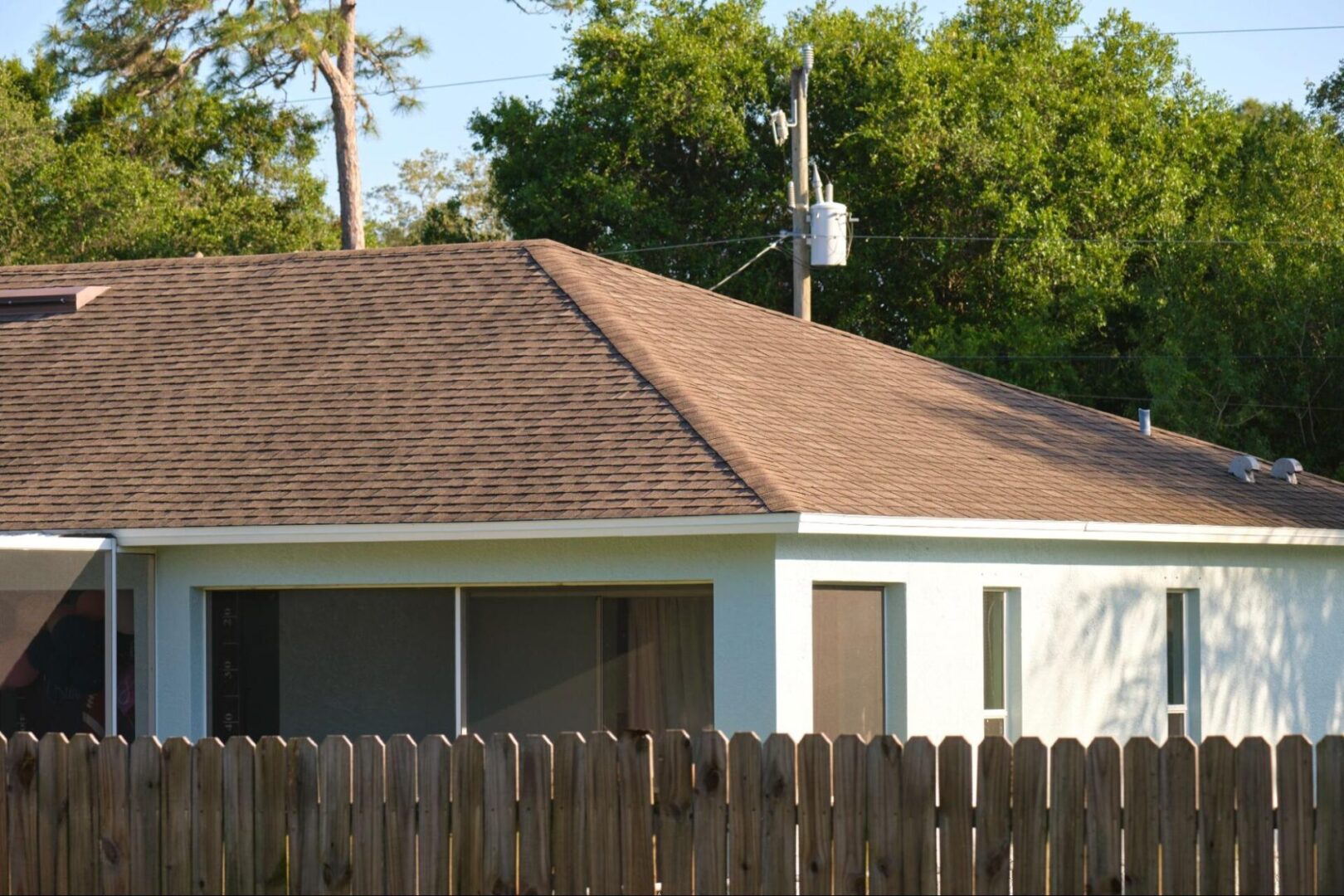 Wooden fence around a home. 