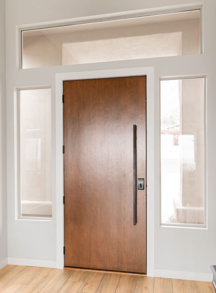 Old drafty entry door causing energy loss in Owatonna MN