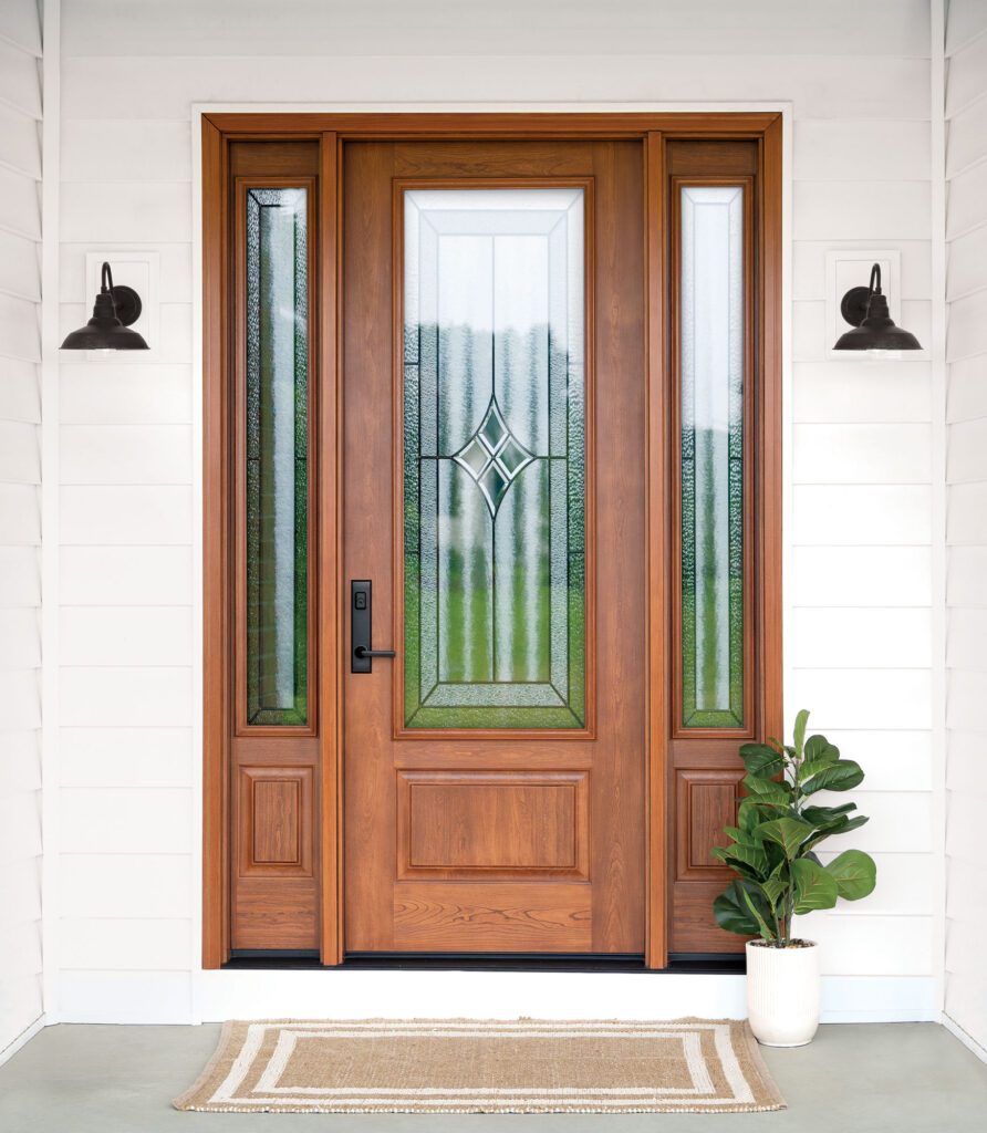 Professional exterior door installation crew working on Kasson MN home