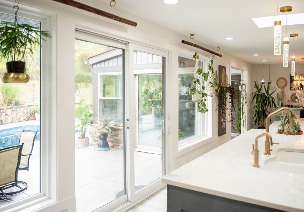 Bright modern kitchen with sliding glass doors