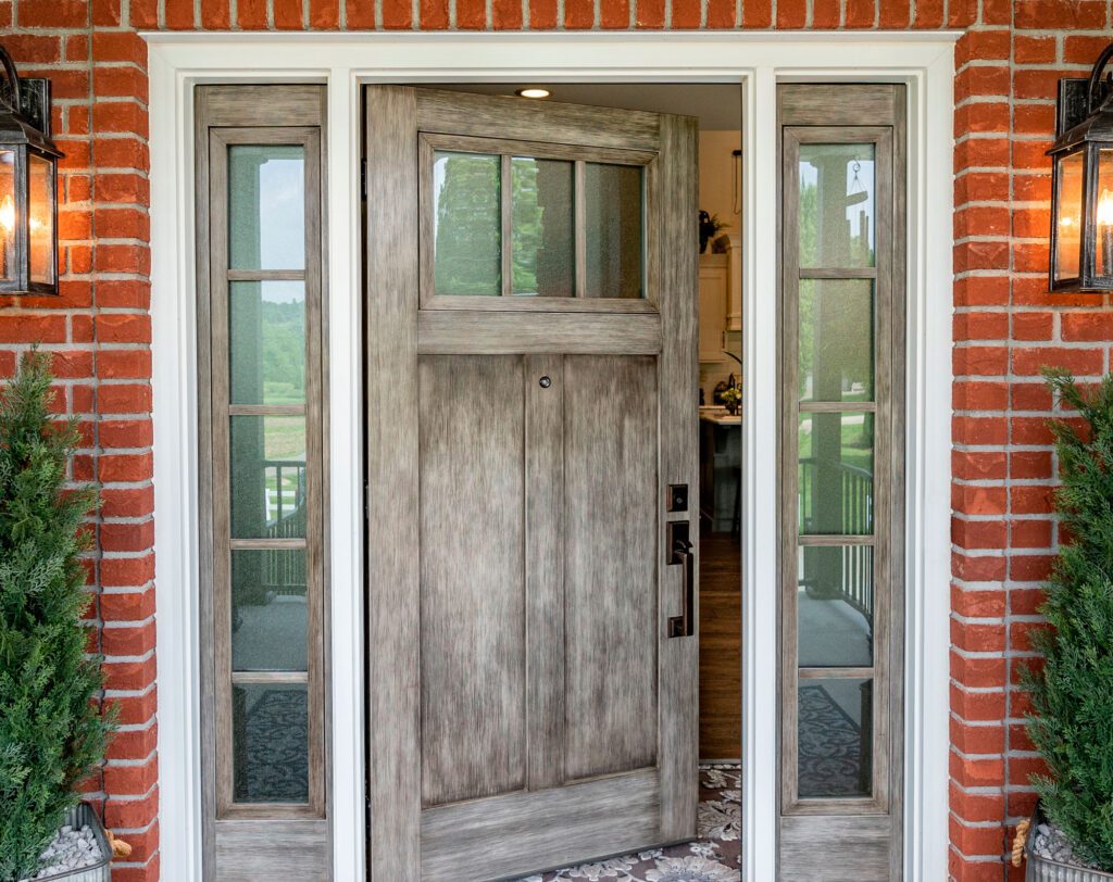 Comparison of door repair and replacement in Kasson MN