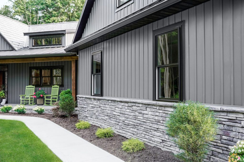 homeowner reviewing siding replacement cost estimate in Owatonna MN