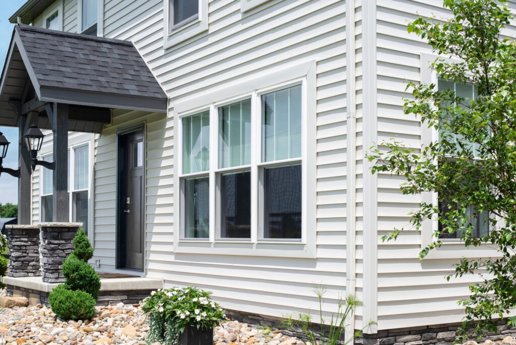 damaged siding panels on residential home needing siding replacement in Kasson MN