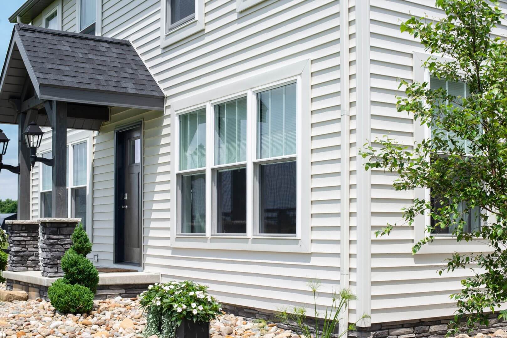 damaged siding panels on residential home needing siding replacement in Kasson MN
