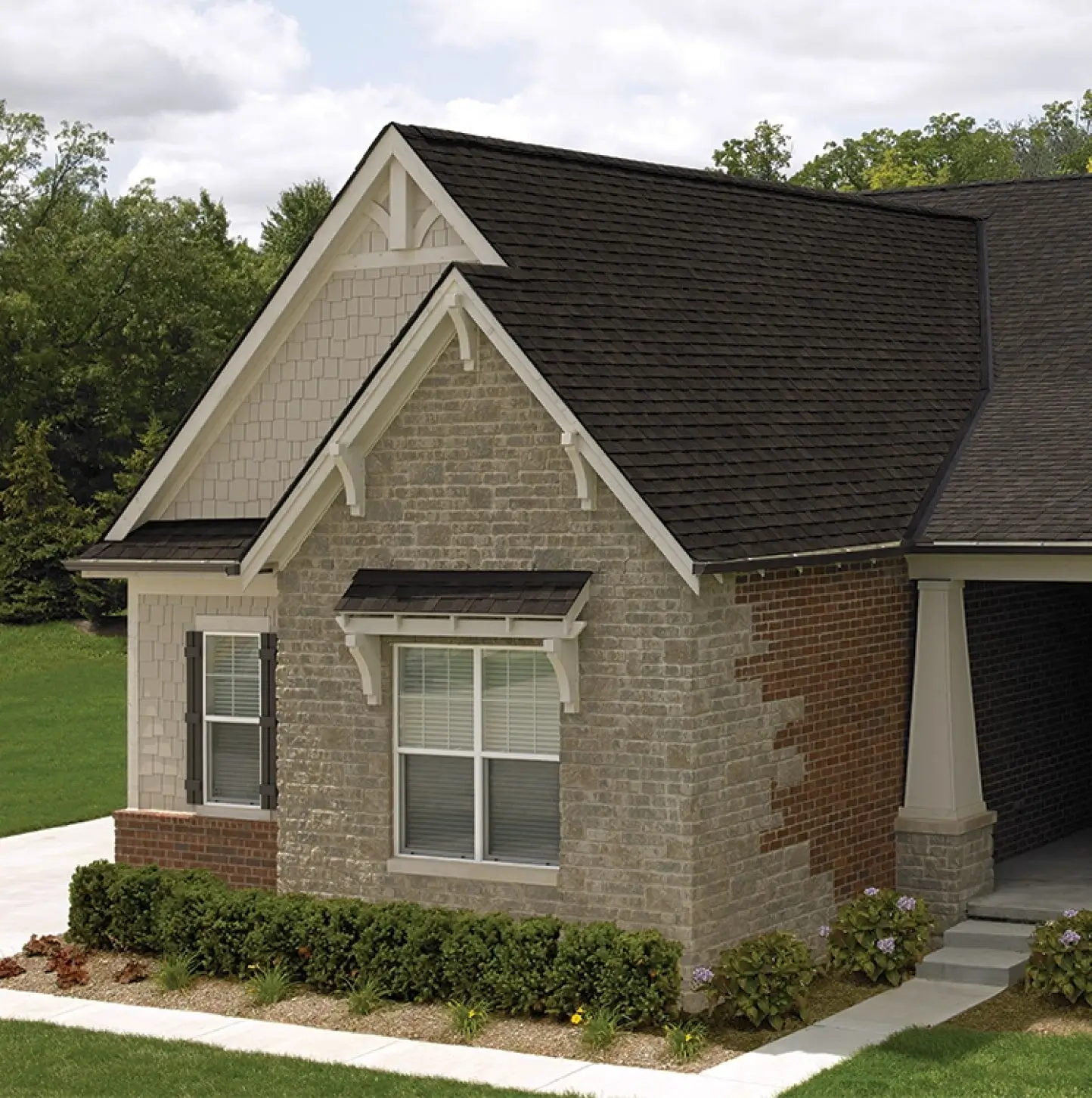 storm damaged roof with missing shingles on Owatonna MN home
