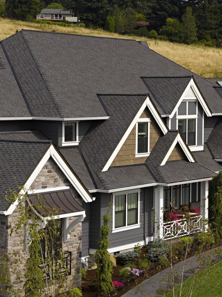Storm damaged roof with missing shingles on Kasson MN home