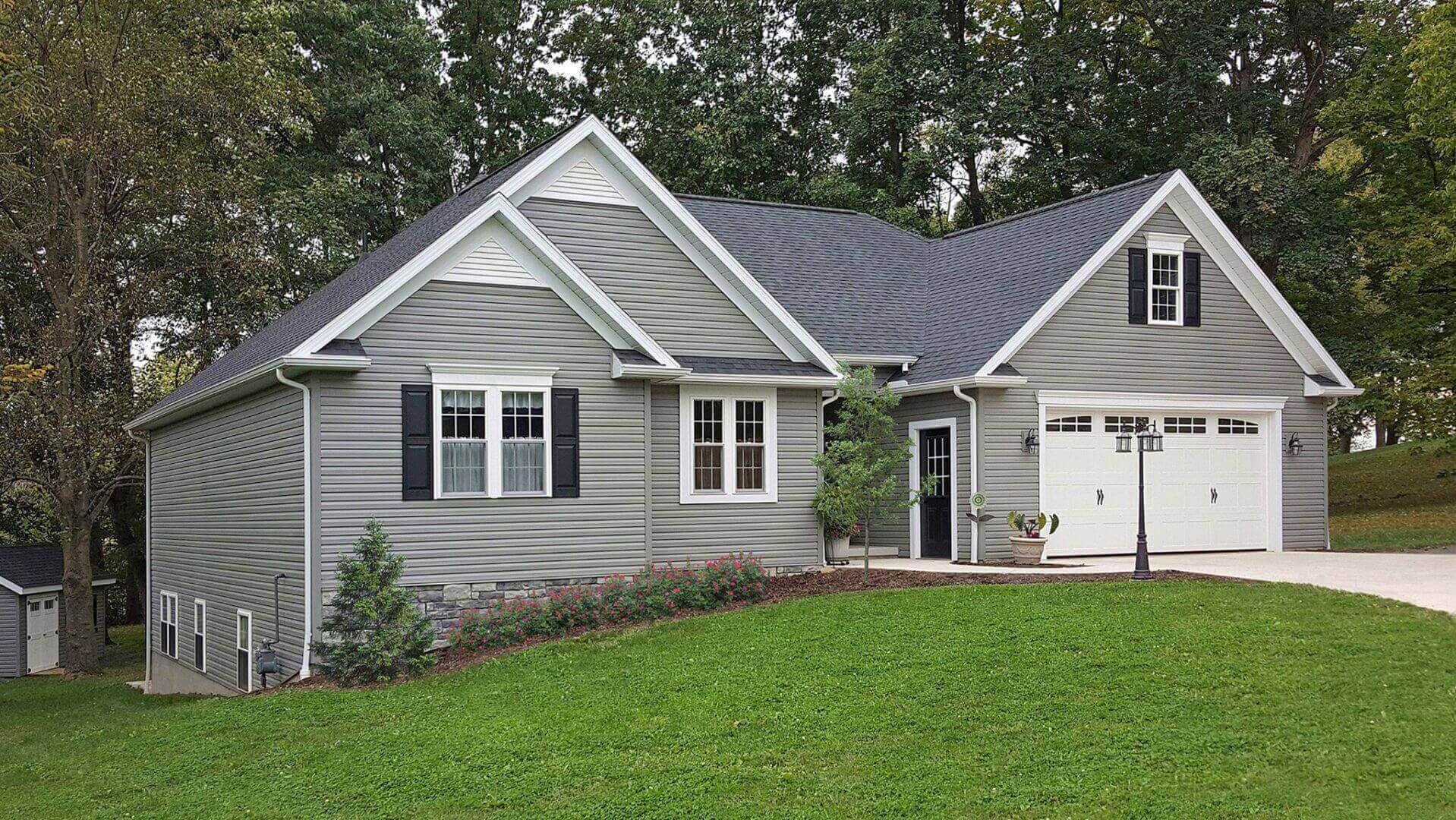 vinyl siding and steel siding comparison on Kasson MN residential homes
