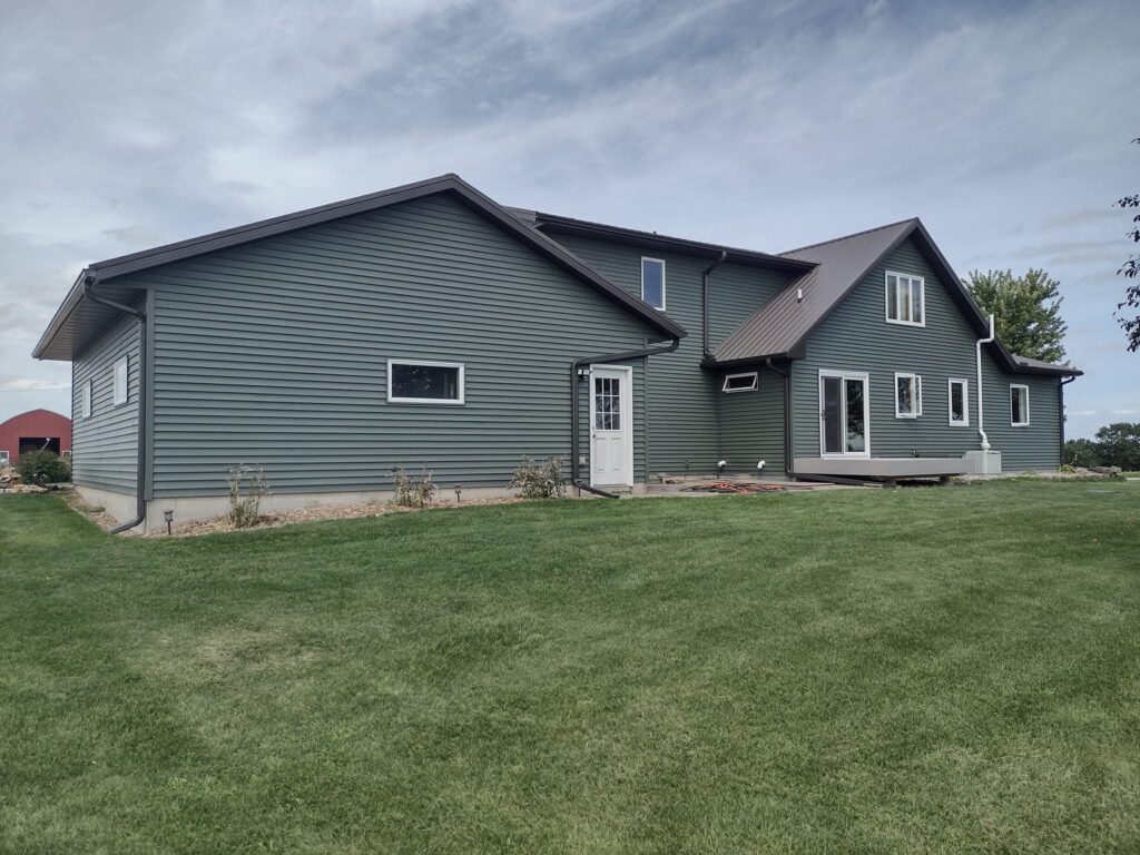 Water damage behind siding detected during inspection in Rochester MN