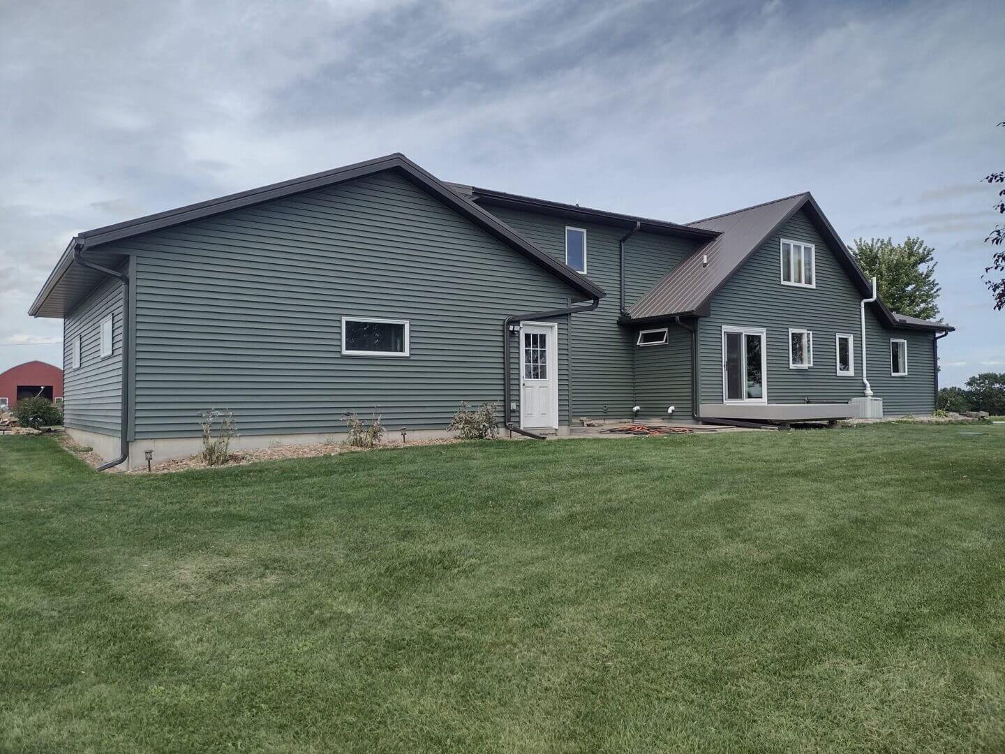 Water damage behind siding detected during inspection in Rochester MN
