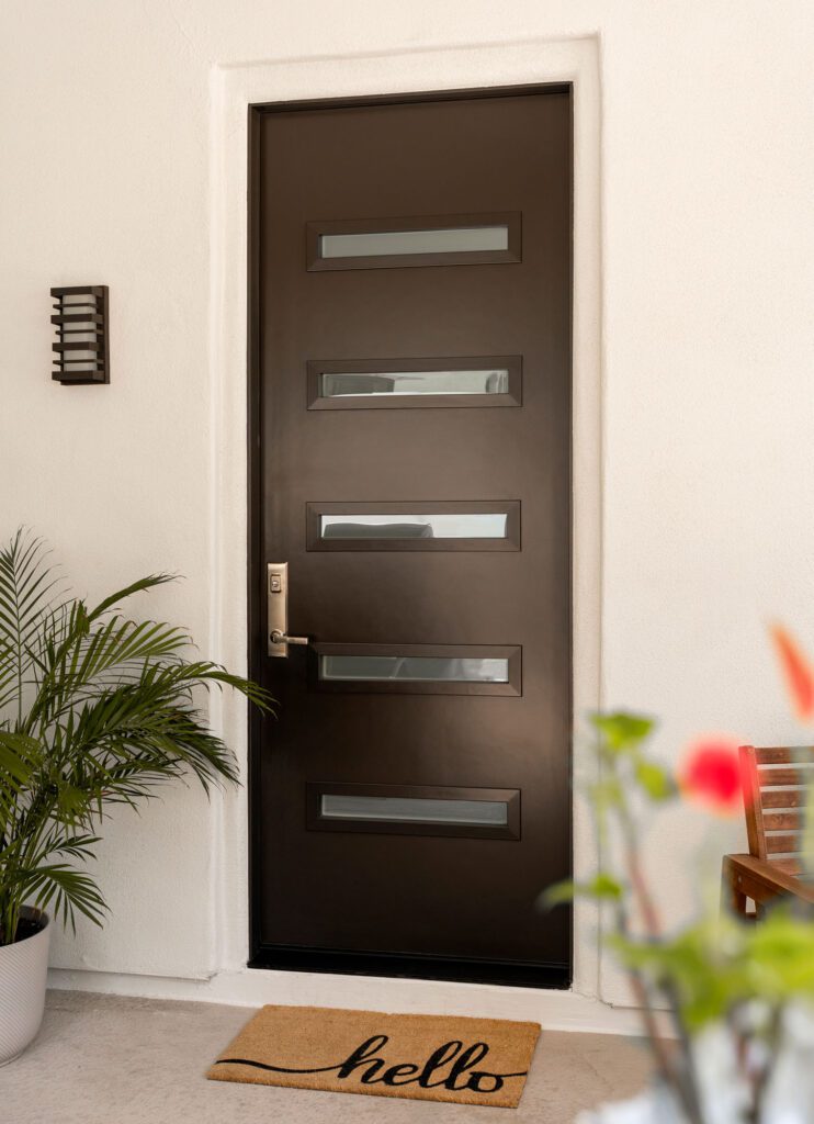 Weather damaged front door in Owatonna MN winter