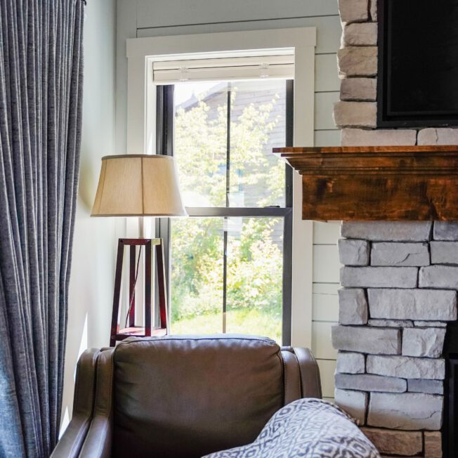 Permit paperwork and contractor clipboard for window replacement project in Kasson MN